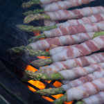 Bacon Wrapped Asparagus Yakitori over flames on Big Green Egg
