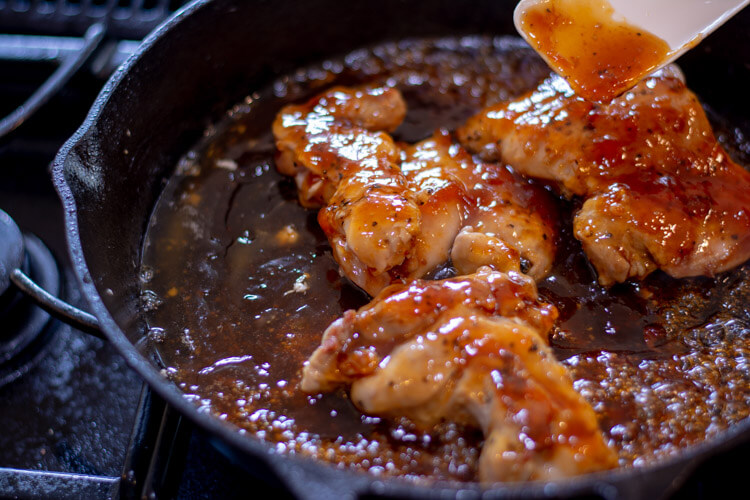 Baked Apricot Chicken in a Cast Iron Skillet - Adding the Glaze
