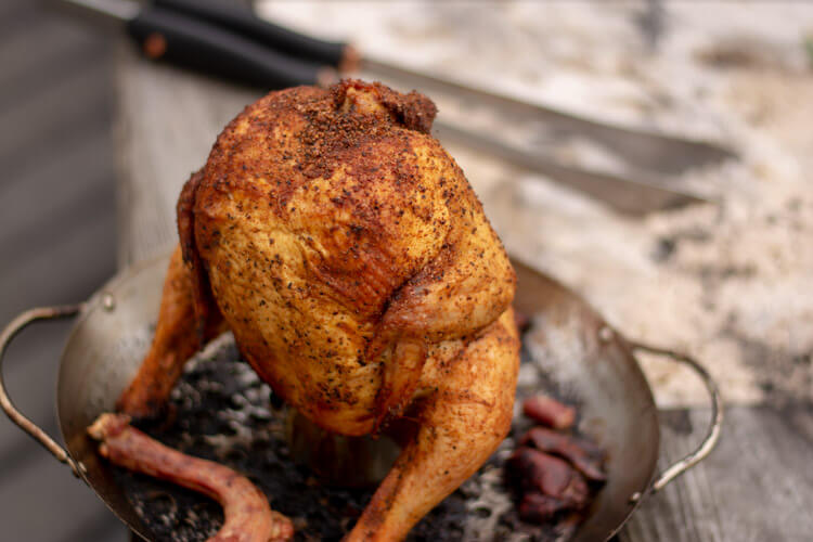 Roasted Chicken on the Grilling Table on a beer can pan.