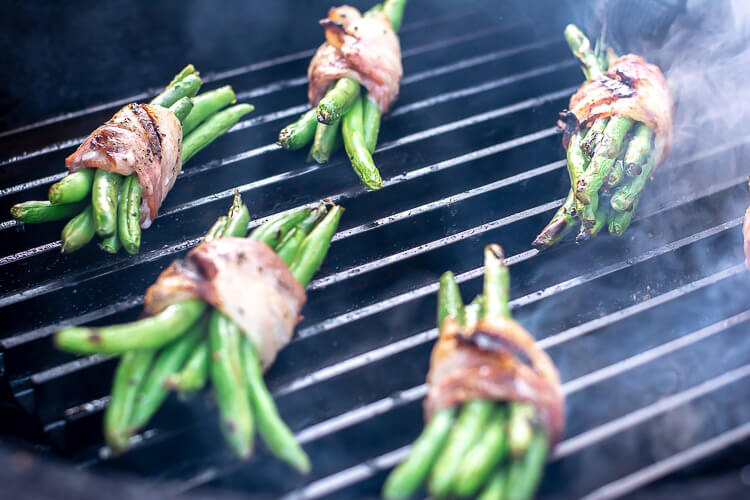 Nearly Finished Bacon Wrapped Green Beans on the BGE. The Asian Sauce is Creating a bit of Smoke