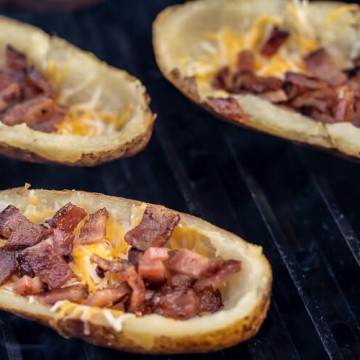 Cheese and Bacon Bits are Bubbling on the Potato Skins on the Big Green Egg