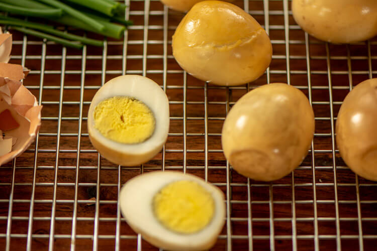 A nice smoky flavor on these hard boiled eggs. Perfect for a fun side dish.