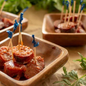 Cranberry Chili Brats with Toothpicks in Small Wooden Bowls ready for serving