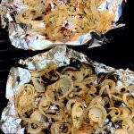 Sliced grilled onions in foil packs with red wine vinegar and oregano