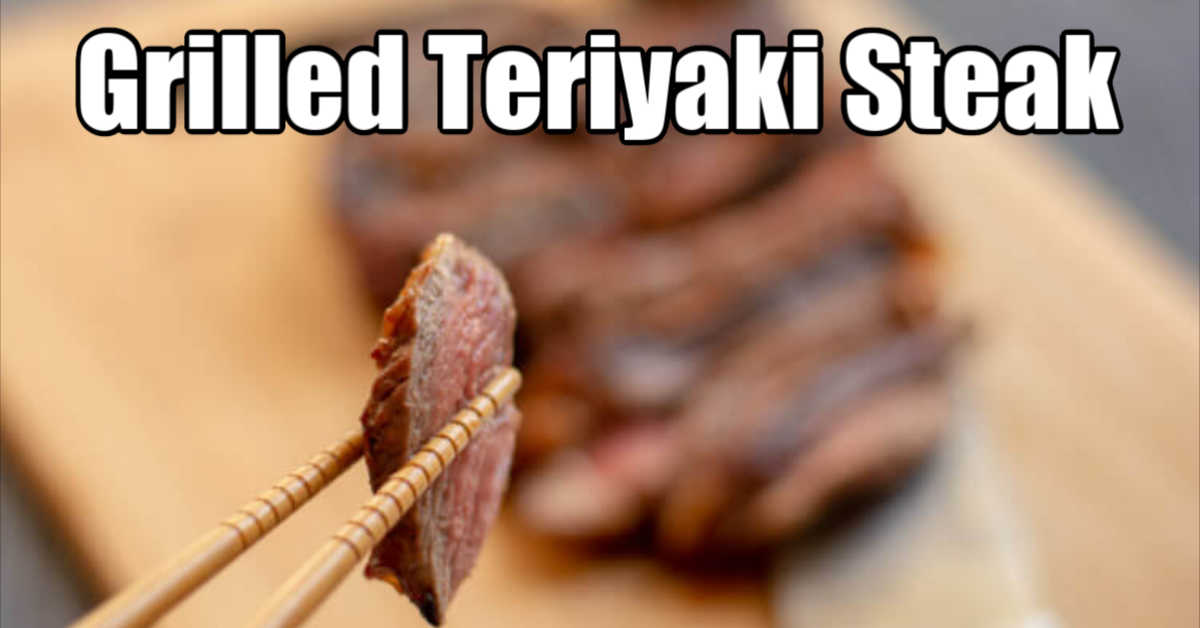grilled teriyaki marinated steak sliced and being held by chopsticks