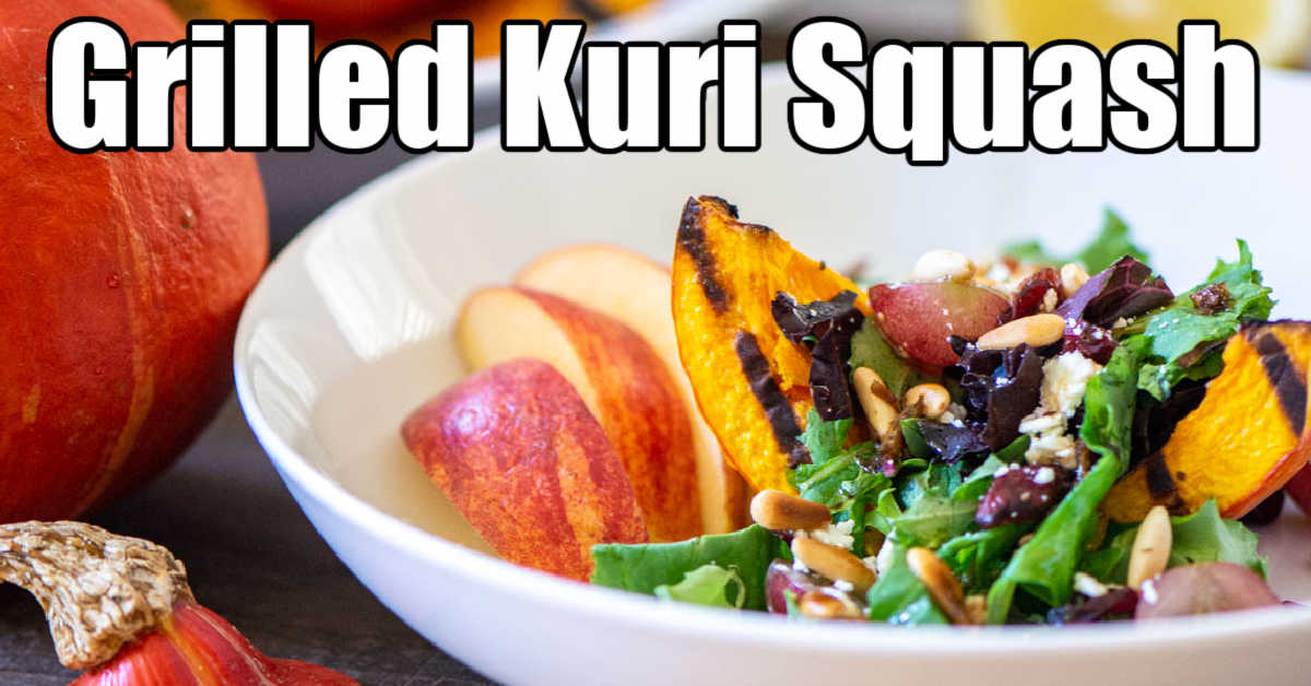 salad with pine nuts, craisins, feta cheese and apples over a slice of grilled red kuri squash