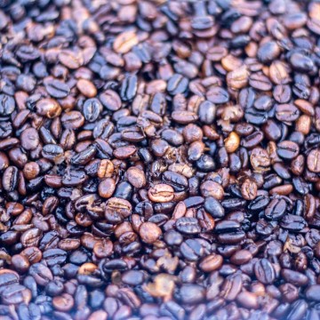 closeup of the roasted coffee beans after removing from the grill.