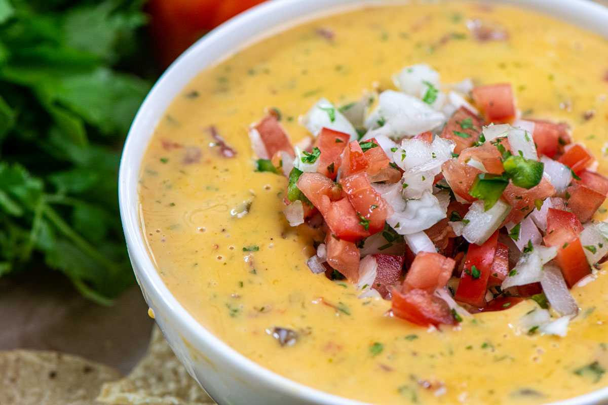 top down view of a bowl of queso.