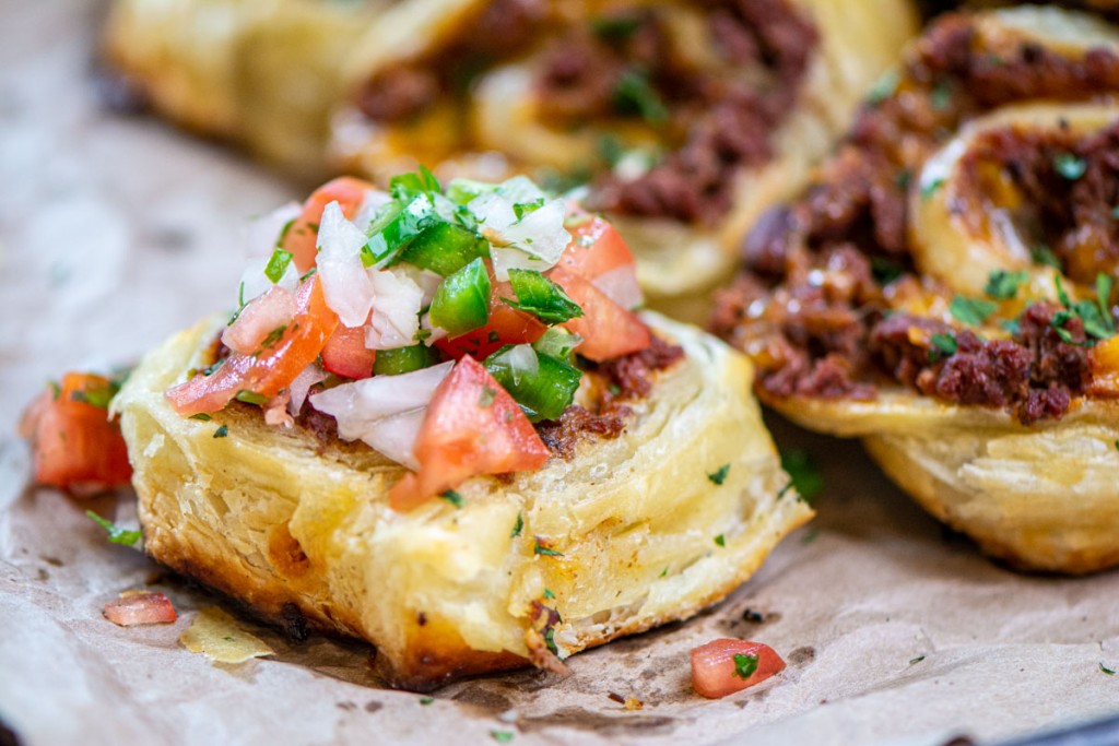 puff pastry filled with ground meat and cheese and topped with fresh pico de gallo.