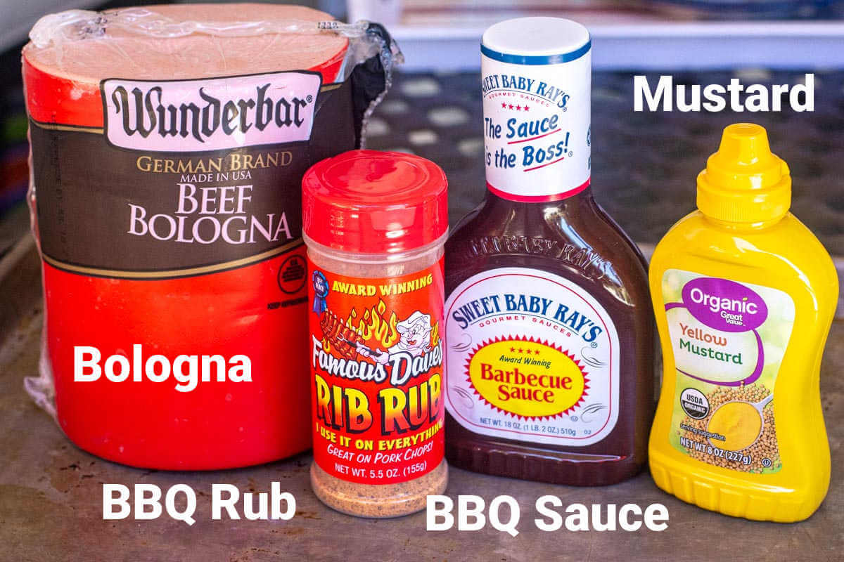 ingredient photo showing the bologna, rub, BBQ sauce, and mustard with labels.