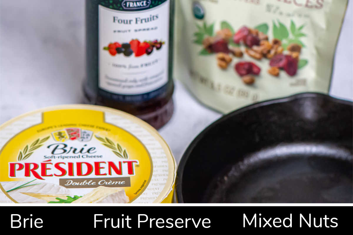 ingredient photo showing the President Double Creme Brie, fruit preserves and mixed nuts and dried fruit.