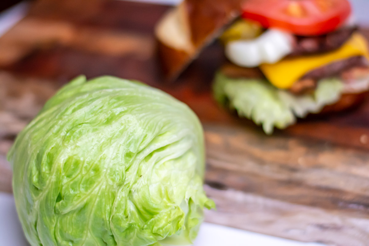 iceberg lettuce with a burger.
