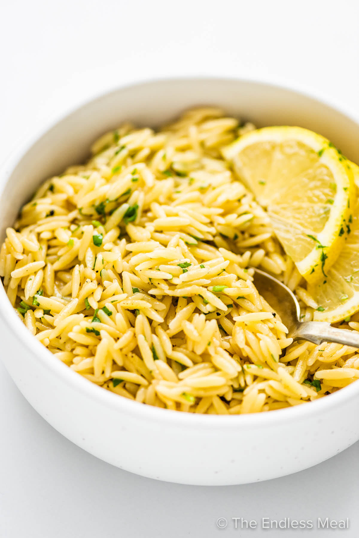 white bowl with a lemon orzo pasta