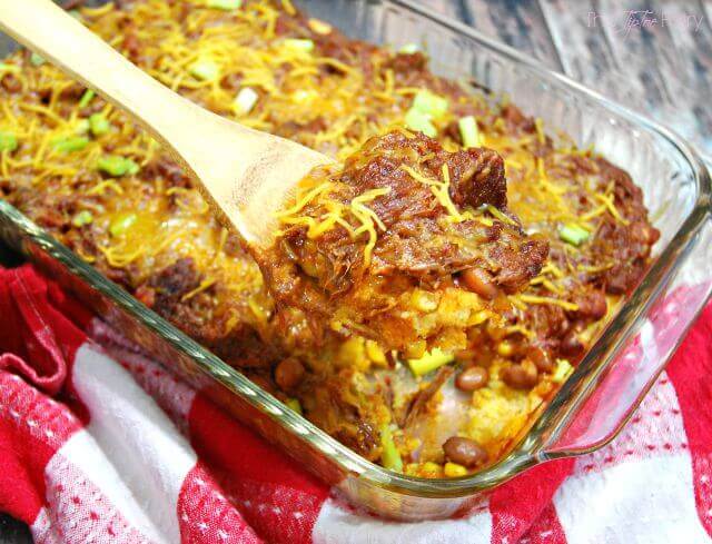 glass baking dish with a brisket casserole.