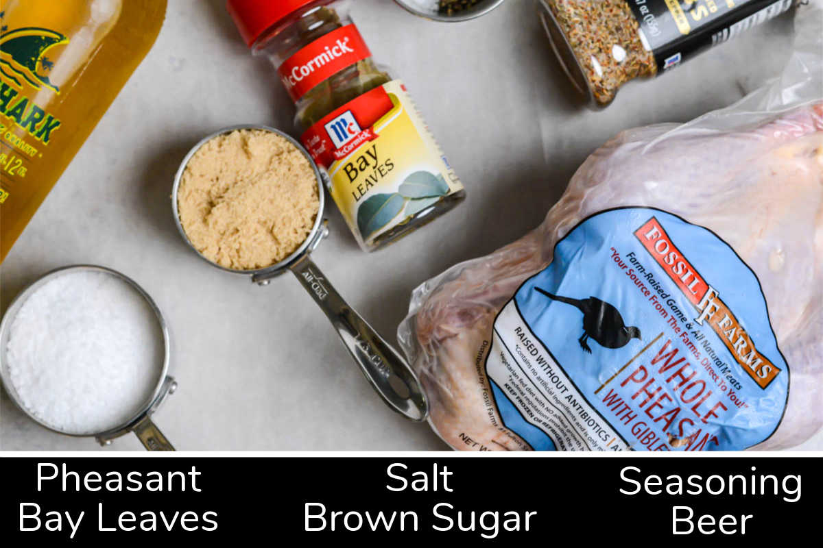 ingredient photo showing the pheasant, brining ingredients and seasoning with labels.