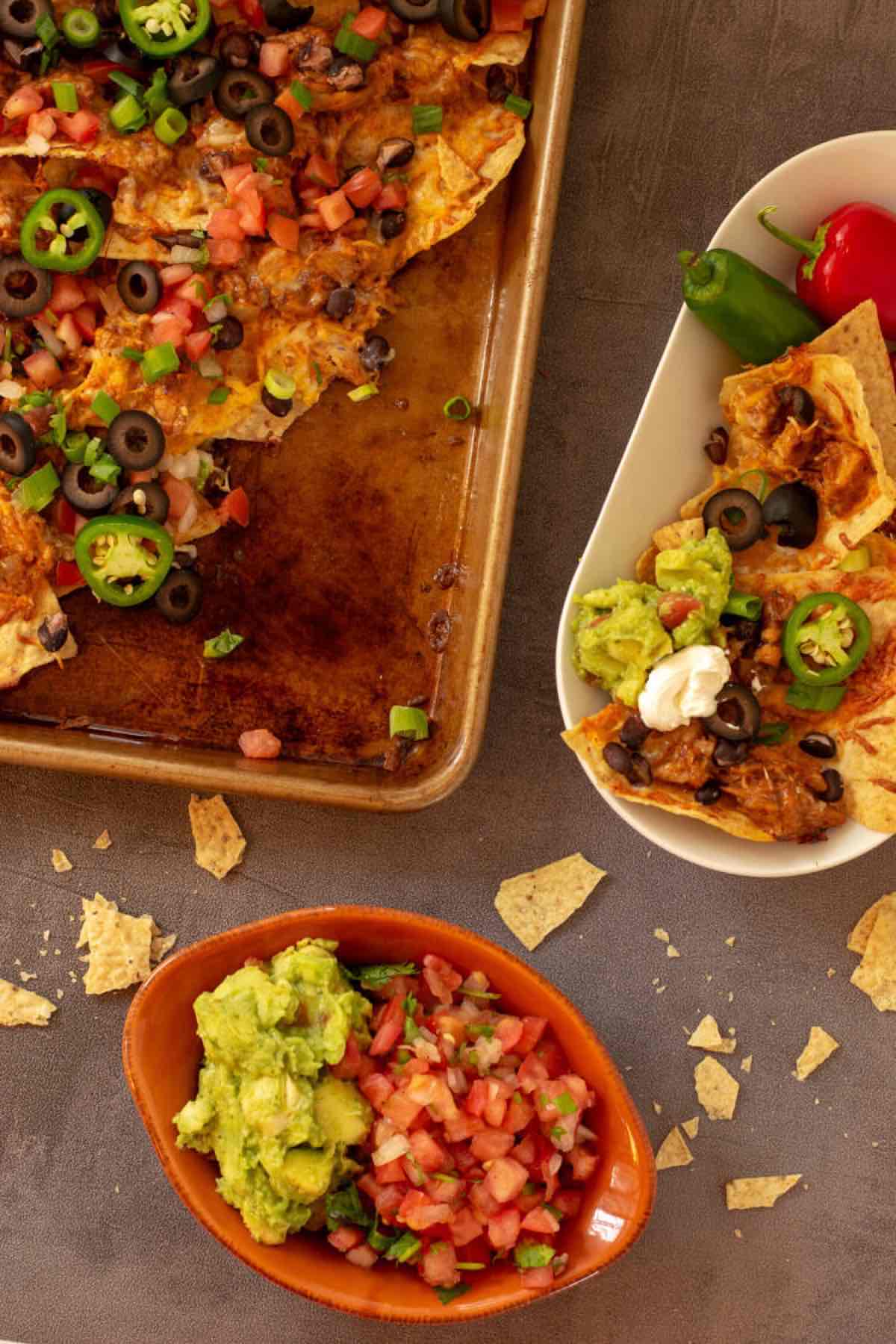 sheet pan nachos and salsa on the side.