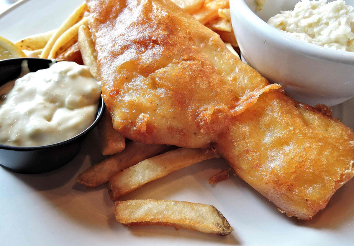 Fish & chips with fries and tartar sauce.
