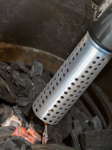 hot air charcoal lighter inside the big green egg with lighted coals without using lighter fluid.